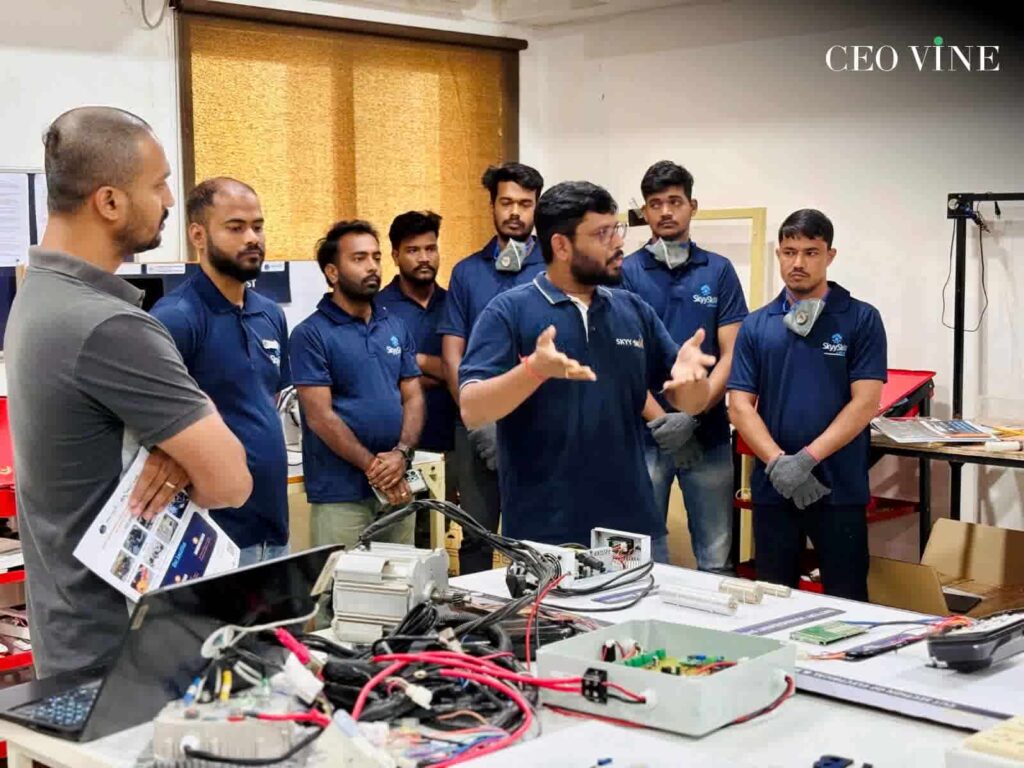 Himanshu at his manufacturing unit explaining the technology to a client from Bosch